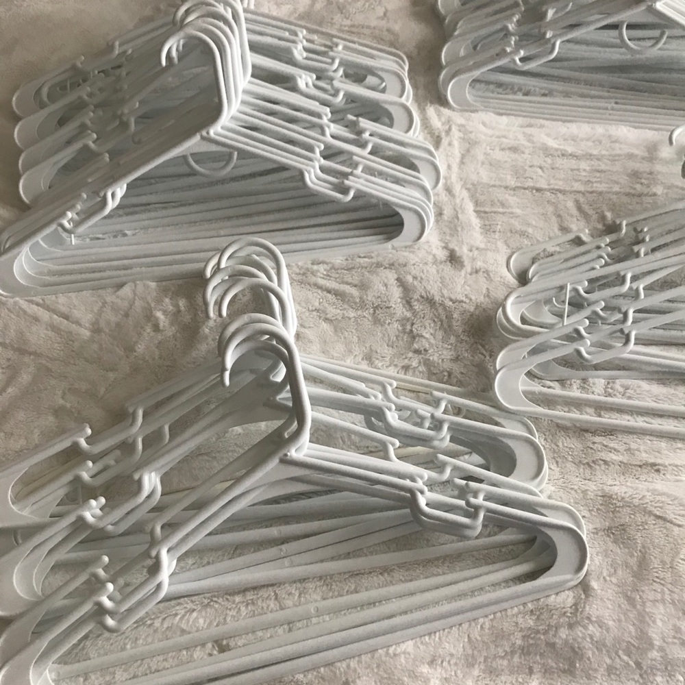 80 White plastic hangers